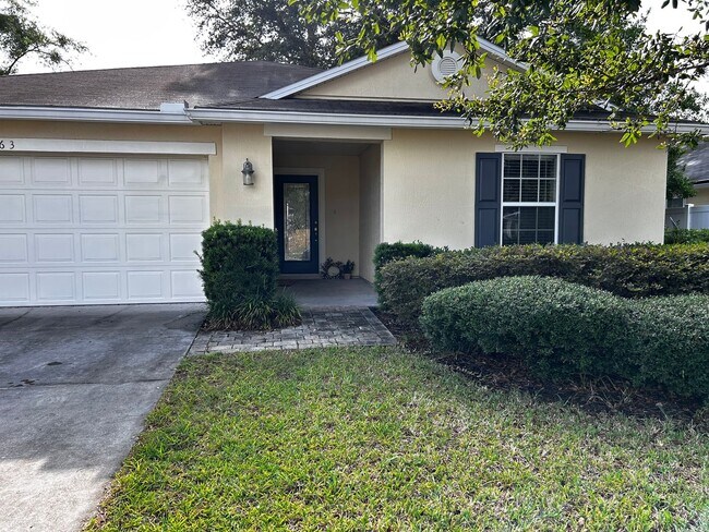 Building Photo - Newer Build 3/2 with Fenced in yard minute...