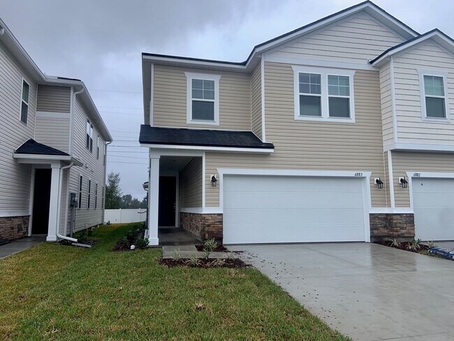 Building Photo - Beautiful NEW Townhome