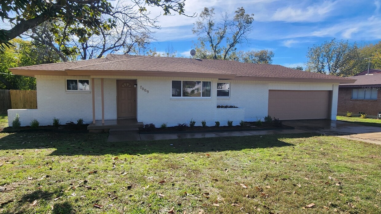Front Elevation / All new windows - 7009 Overhill Rd