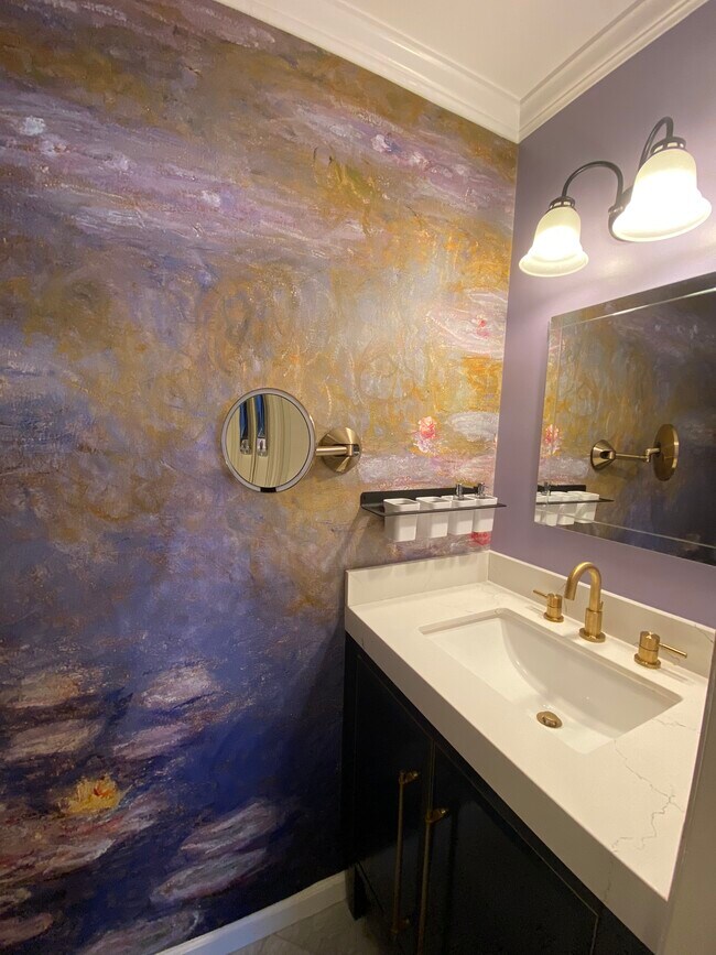 Half Bath with Monet Wallpaper and built-in wall mirror - 4 Admiral Dr