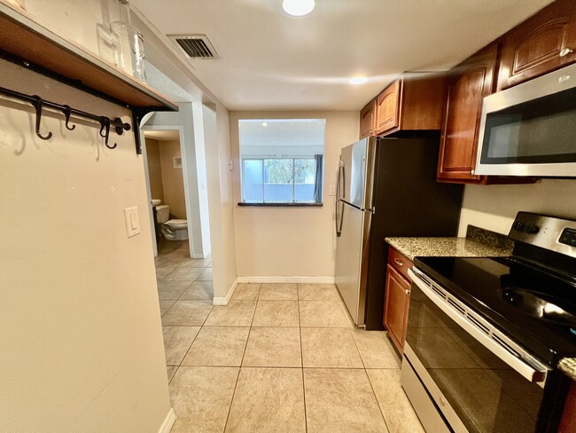 Kitchen and Half Bathroom on 1st Floor - 9371 Fontainebleau Blvd