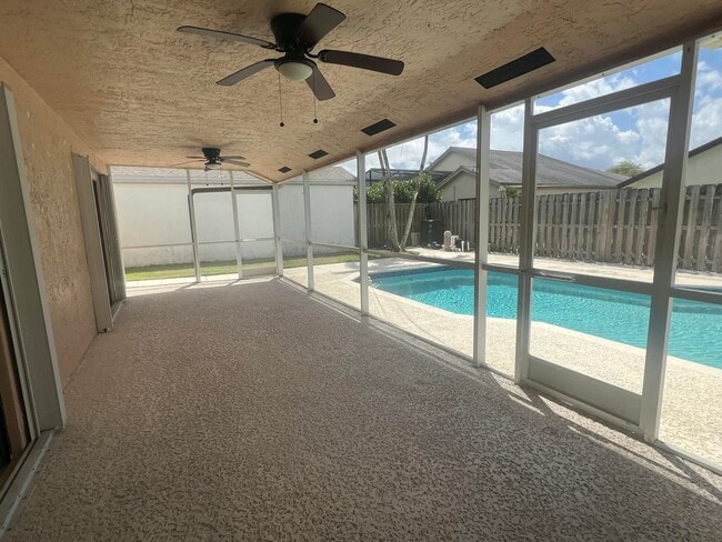 Foto del edificio - Rustlewood Avenue, Boca Raton, FL 33428 - 4 BR 2 BA single-family home