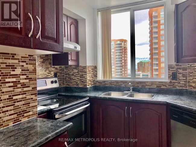 Photo du bâtiment - 430-430 McLevin Ave