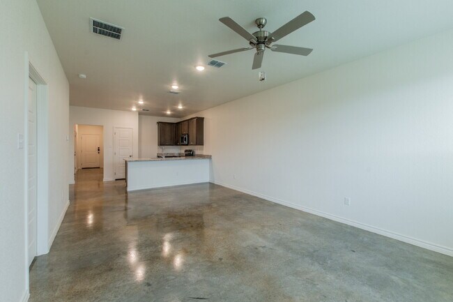 Building Photo - Brand New 3BR Duplex with Modern Concrete Floors & Fenced Yard!
