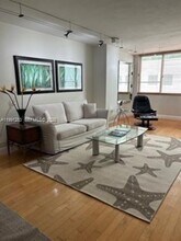 Building Photo - 5005 Collins Ave