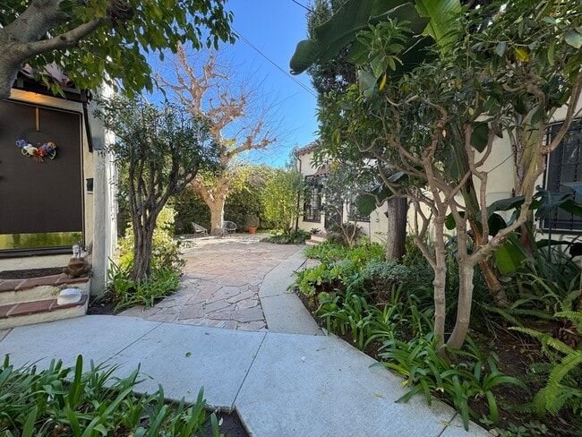 Building Photo - Discover Your Private Cottage Oasis! a must-see!