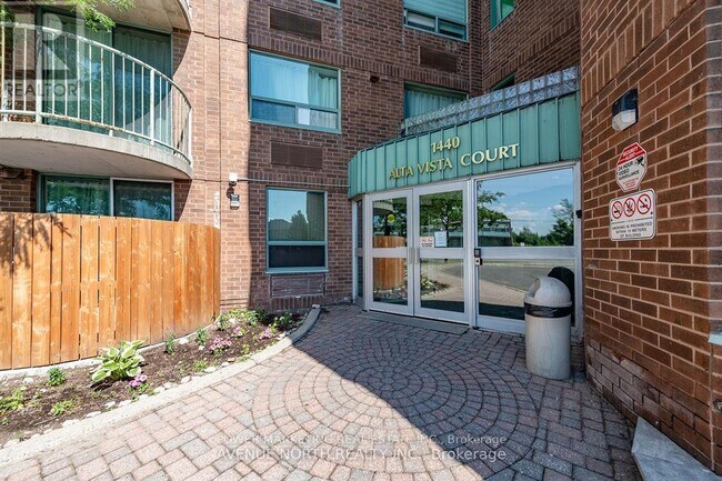 Photo du bâtiment - 1440 Heron Rd