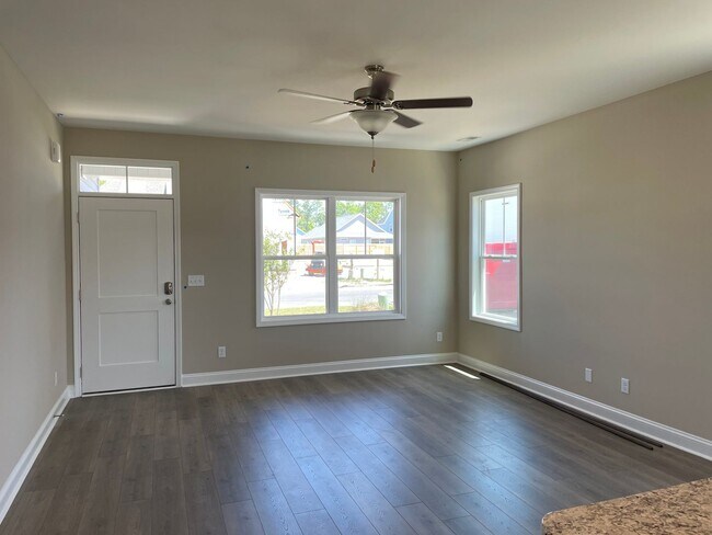 Building Photo - Welcome to this stunning 4-bedroom, 3-bath...