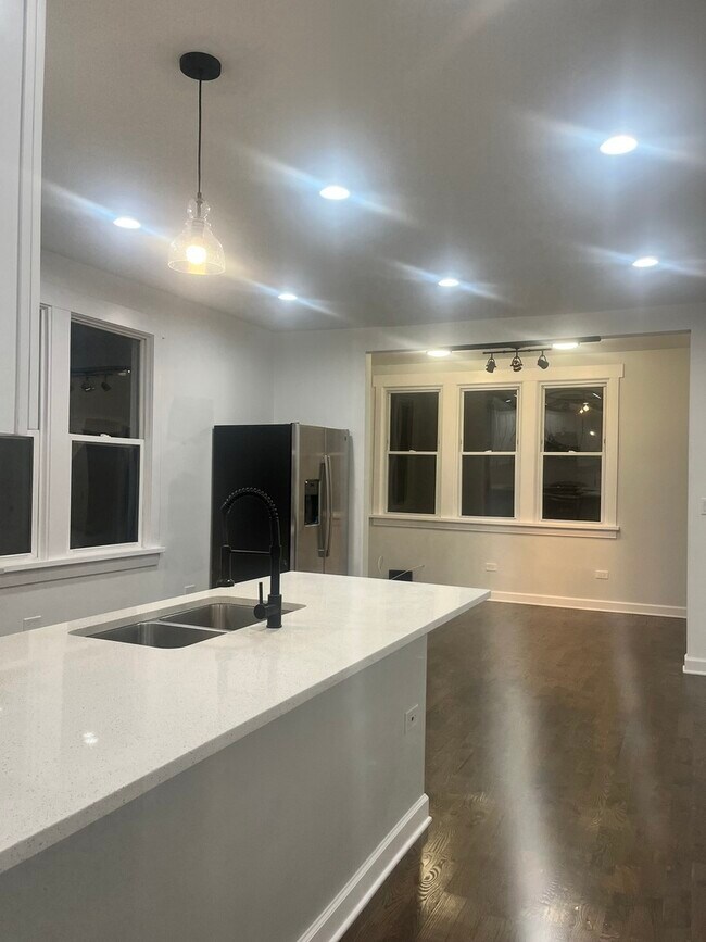 Building Photo - 5212 S Lorel Ave