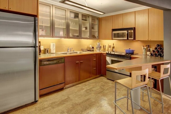 updated kitchen with new applicances - 732 11th Ave, E. Apartments