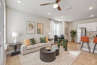 The Cape: 1BA, 1BR- Living Room - Flats at East Bay