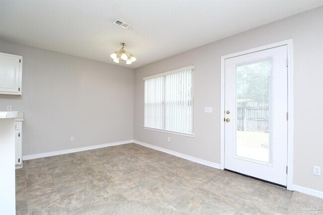 Foto del edificio - 6234 Cottage Woods Dr