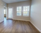 This 600 square foot apartment in Kissimmee, Florida, offers a well-designed living space that maximizes efficiency and comfort. The single-story layout comprises one bedroom, one bathroom, and an open-concept kitchen and living area. The primary bedroom, measuring 130 square feet, provides ample space and features large windows that flood the room with natural light.

Throughout the apartment, warm wood-toned flooring creates a cohesive and inviting atmosphere. The kitchen boasts modern white cabinetry, stainless steel appliances, and a convenient center island, perfect for meal preparation or casual dining. A subway tile backsplash adds a touch of contemporary style.

The bathroom features a clean, neutral palette with a single vanity and a combination tub-shower. A spacious closet with built-in shelving offers generous storage solutions. The living area is bright and airy, with windows that provide views of the surrounding area and allow plenty of sunlight to enter the space.

Ceiling fans and recessed lighting fixtures contribute to the overall comfort and ambiance of the apartment. The neutral wall colors throughout provide a blank canvas for personalization. This well-appointed apartment combines functionality with modern aesthetics, making it an ideal home for those seeking a compact yet comfortable living space in Florida.