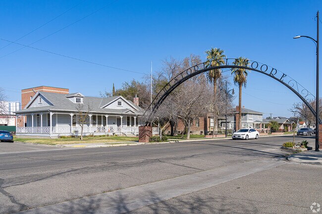 A large archway welcomes visitors to the historical Lemoore neighborhood.