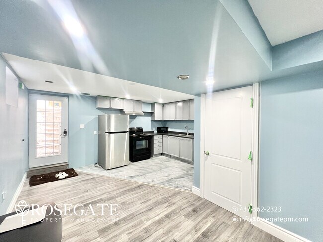 Photo du bâtiment - Bright 1-Bedroom + Den Basement Apartment with All Utilities Included!