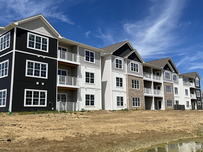 The Residences at Akita Lane Apartments - 4584 Samoyed Dr canal