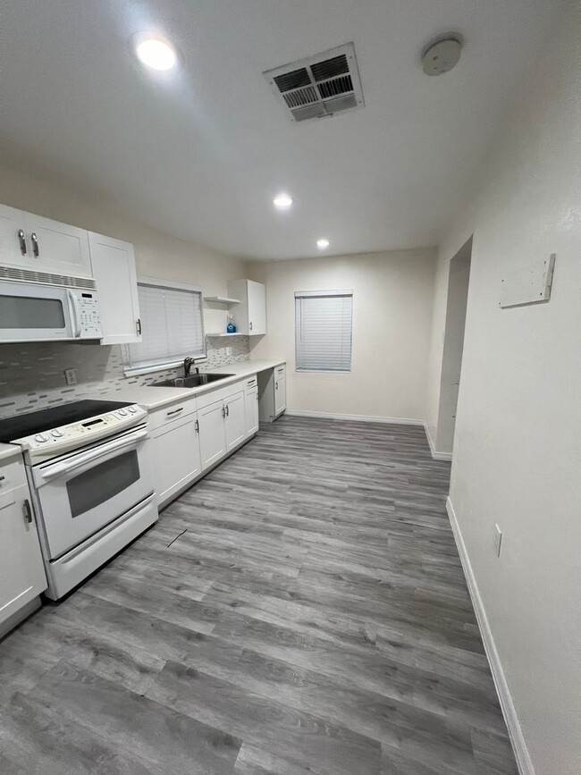 Building Photo - $200. OFF First Month's Rent!