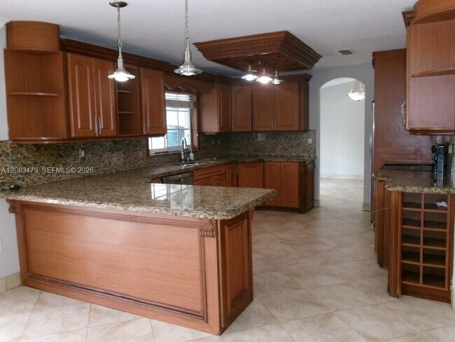 Building Photo - 10620 SW 146th Ct