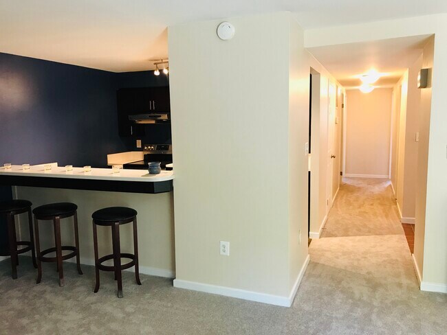 Kitchen and hallway to the 2 bedrooms - 128 W Barre St