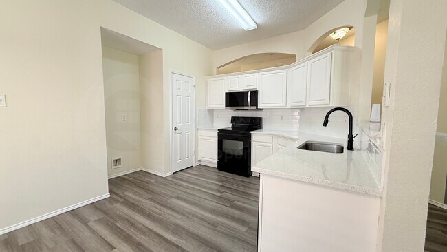 Building Photo - 9021 Rushing River Dr