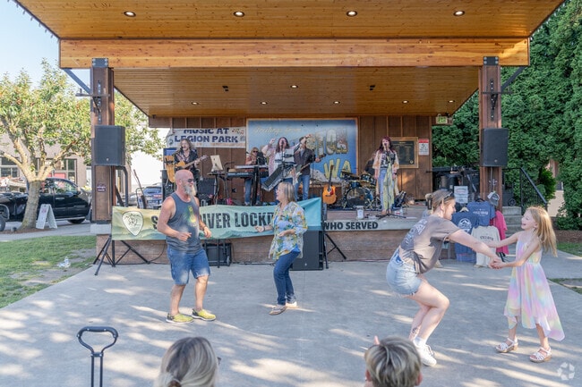 Arlington residents head to Music in the Park at Legion Memorial Park for summer time fun.