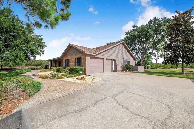 Building Photo - 7740 Lake Hatchineha Rd