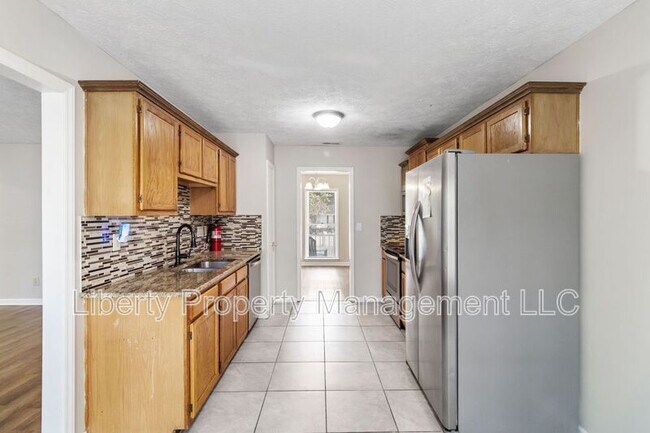 Foto del edificio - 6754 Cedar Chest Ct