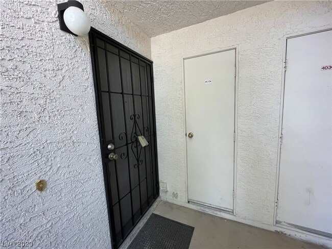 Building Photo - 6671 W Tropicana Ave