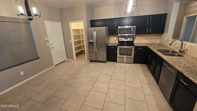 Building Photo - 17848 W Acapulco Ln