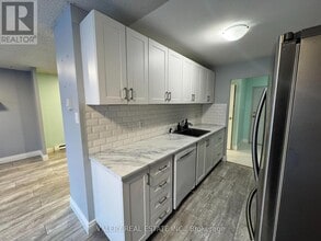 Building Photo - 65 Highland Crescent