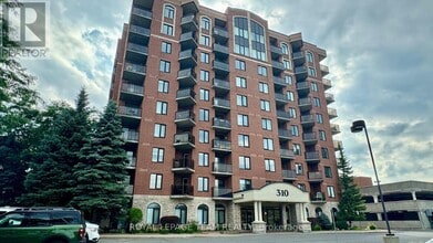 Building Photo - 310-310 Central Park Dr