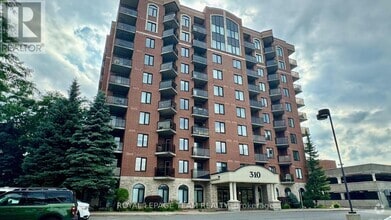 Building Photo - 310-310 Central Park Dr