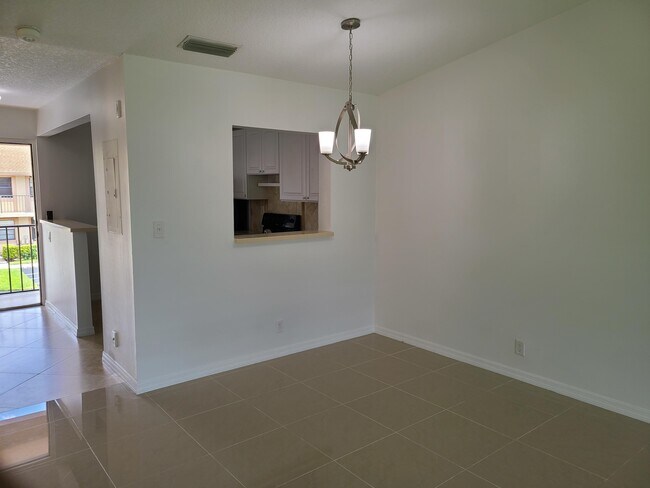 Building Photo - 9431 Boca Cove Cir