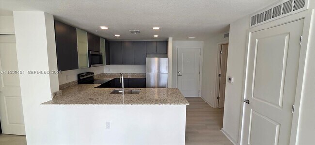 Foto del edificio - 5579 Millennia Park Dr