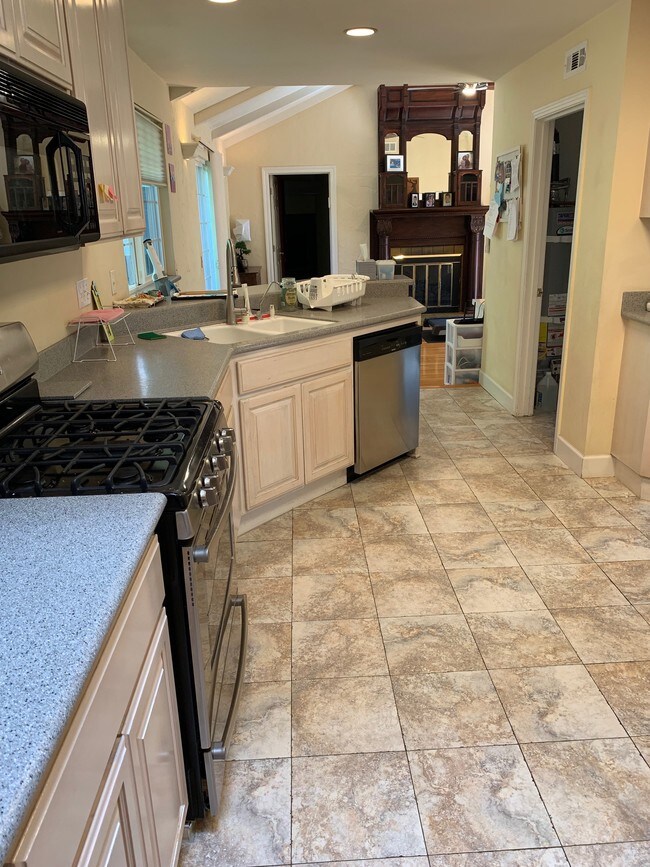 Kitchen opens to Family Room - 16495 Oleander Ave