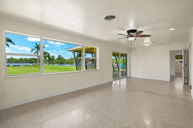 Building Photo - Riverfront Home with OVERSIDED YARD RENTAL in Fort Myers