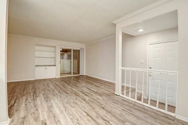 A2 - 1BD, 1BA - 692SF - Living Room - Coronado Villas Apartments