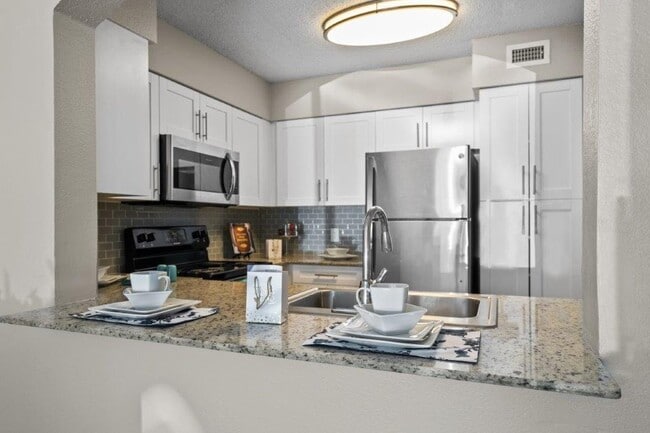 Building Photo - Mosaic Apartments