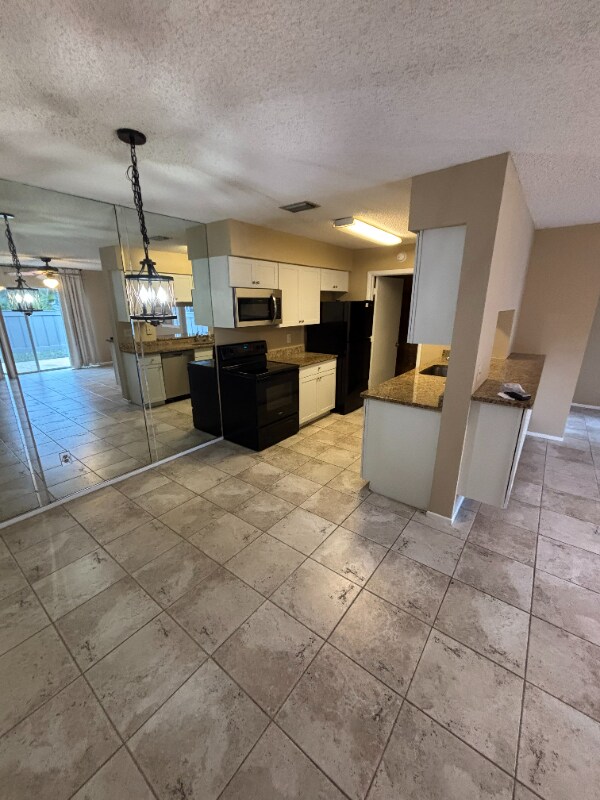 Foto del edificio - 3999 NW Cinnamon Tree Cir