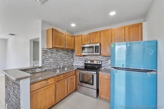 Building Photo - 2854 Coral Springs Dr