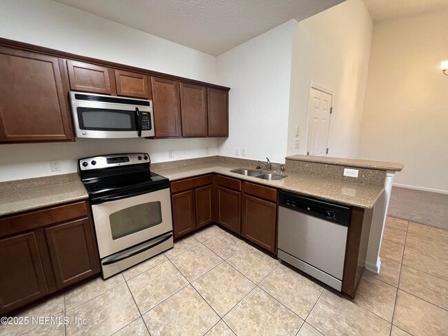 Building Photo - 4908 Key Lime Dr