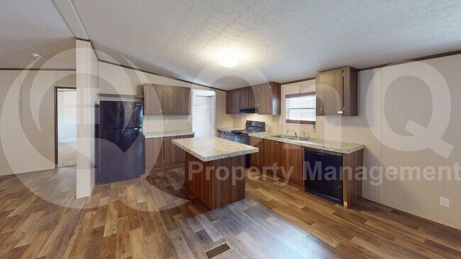 Foto del edificio - 7415 Remington Rd