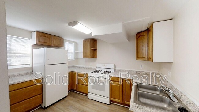 Photo - 2419 E Monument St Apartment