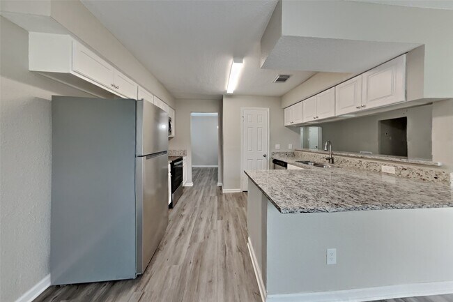 Foto del edificio - 10210 Rippling Fields Dr