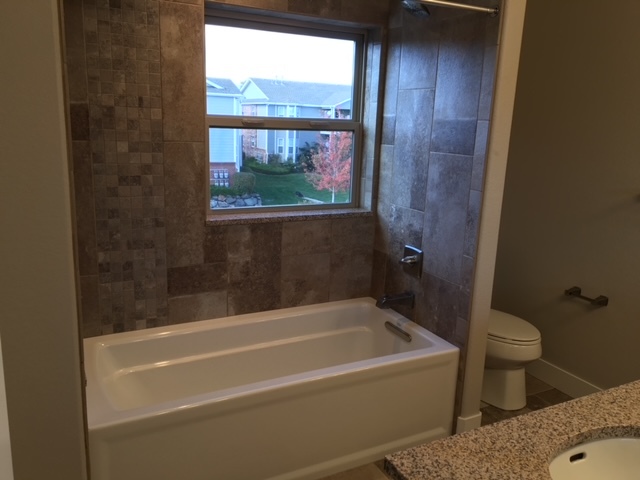 Master tub custom tiles - 11625 W 62nd Pl