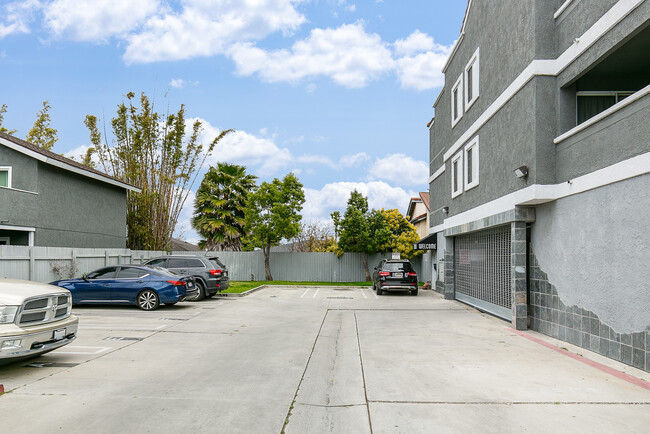 Uncovered Parking Area - Duke Apartment Homes