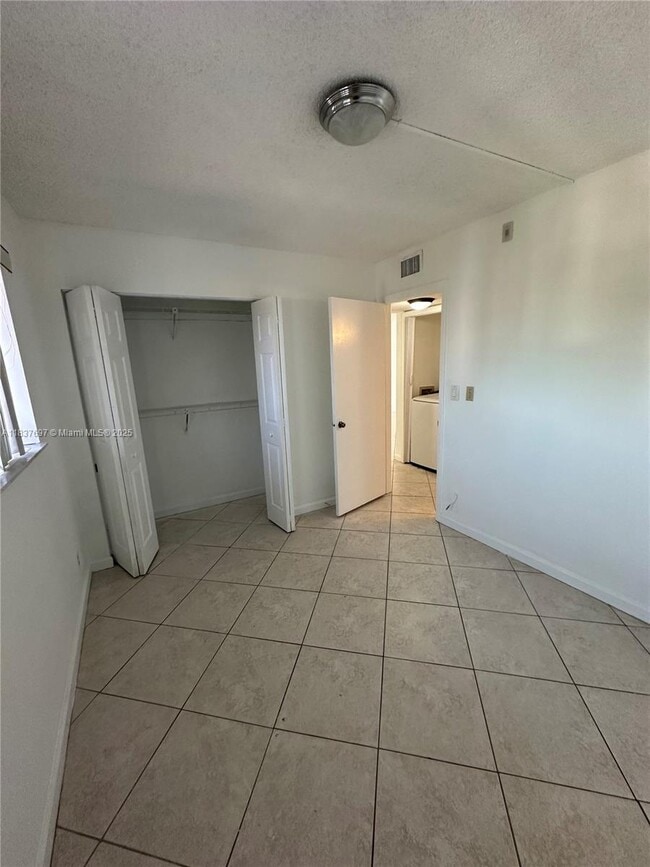Building Photo - 8740 N Sherman Cir