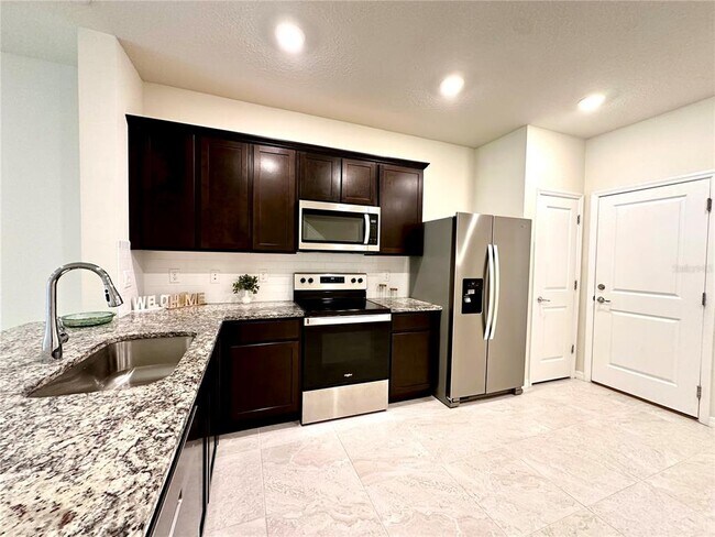 Foto del edificio - 4574 Cypress Cay Wy