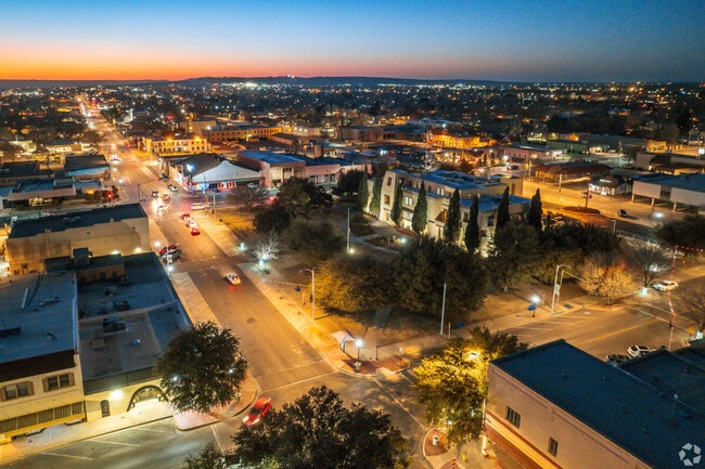 An aerial view of Carlsbad's downtown area at night.
