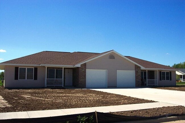 Building Photo - Tomah Property Management North